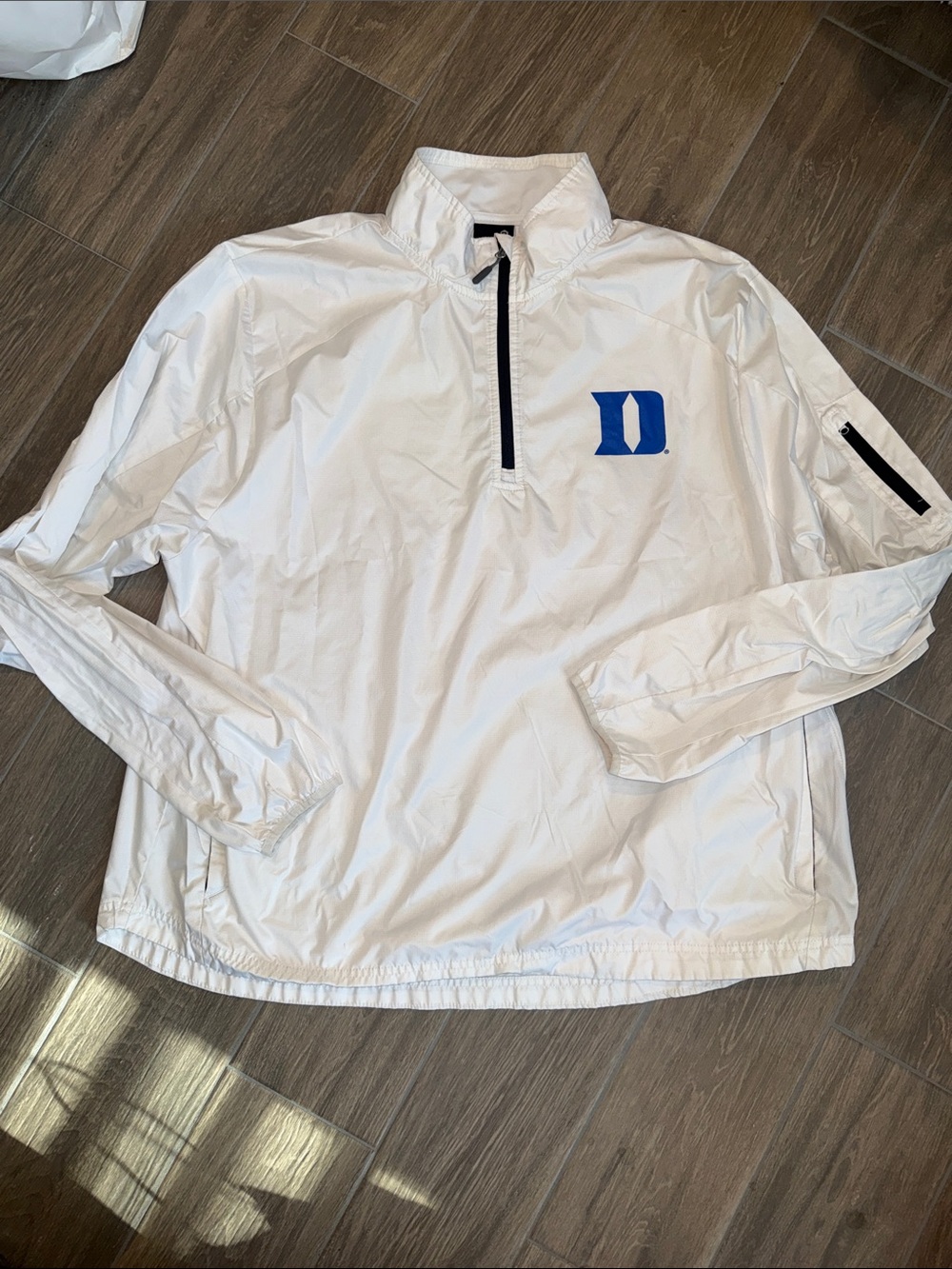 White Quarter-Zip Windbreaker with Blue 'D' Logo